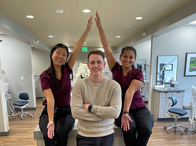 Dr. Charlie Boehm with coworkers