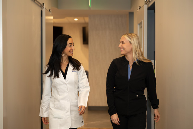 Dr. Shuka Moshiri with a coworker