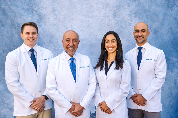 Dr. Charlie Boehm (left) with Dr. Maz Moshiri (right), Dr. Farhad Moshiri (left center), and Dr. Shuka Moshiri (right center)