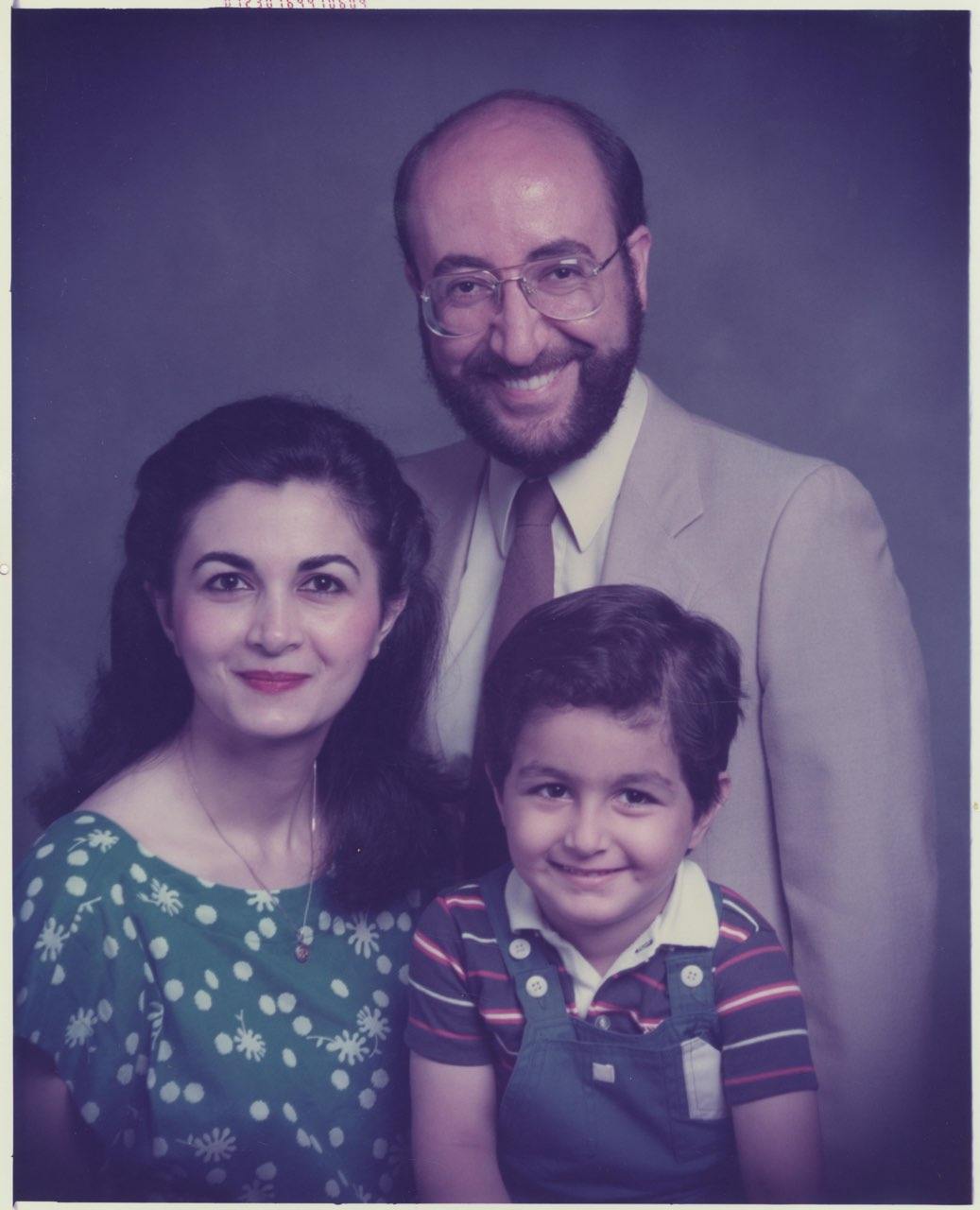 A vintage photo of Dr. Moshiri and his wife, Fariba with their son, Dr. Maz
