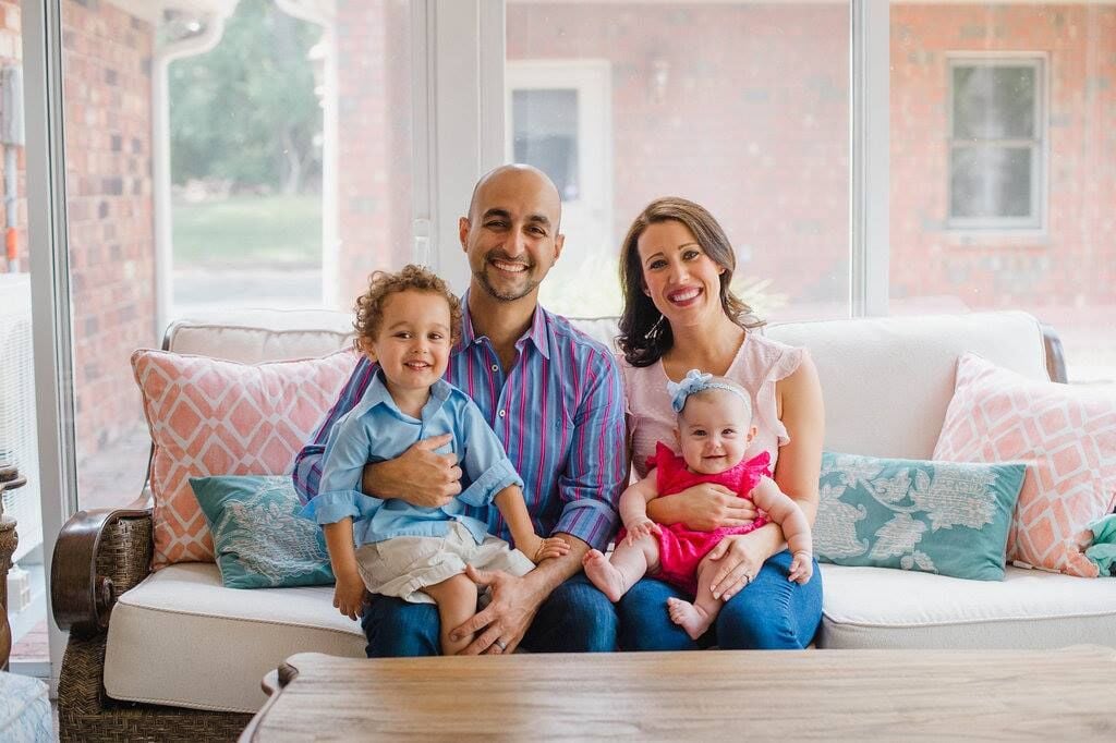 Dr. Maz with his wife and children